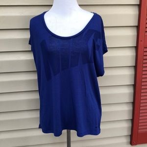 Nike women’s blue, loose fit,dri-fit shirt